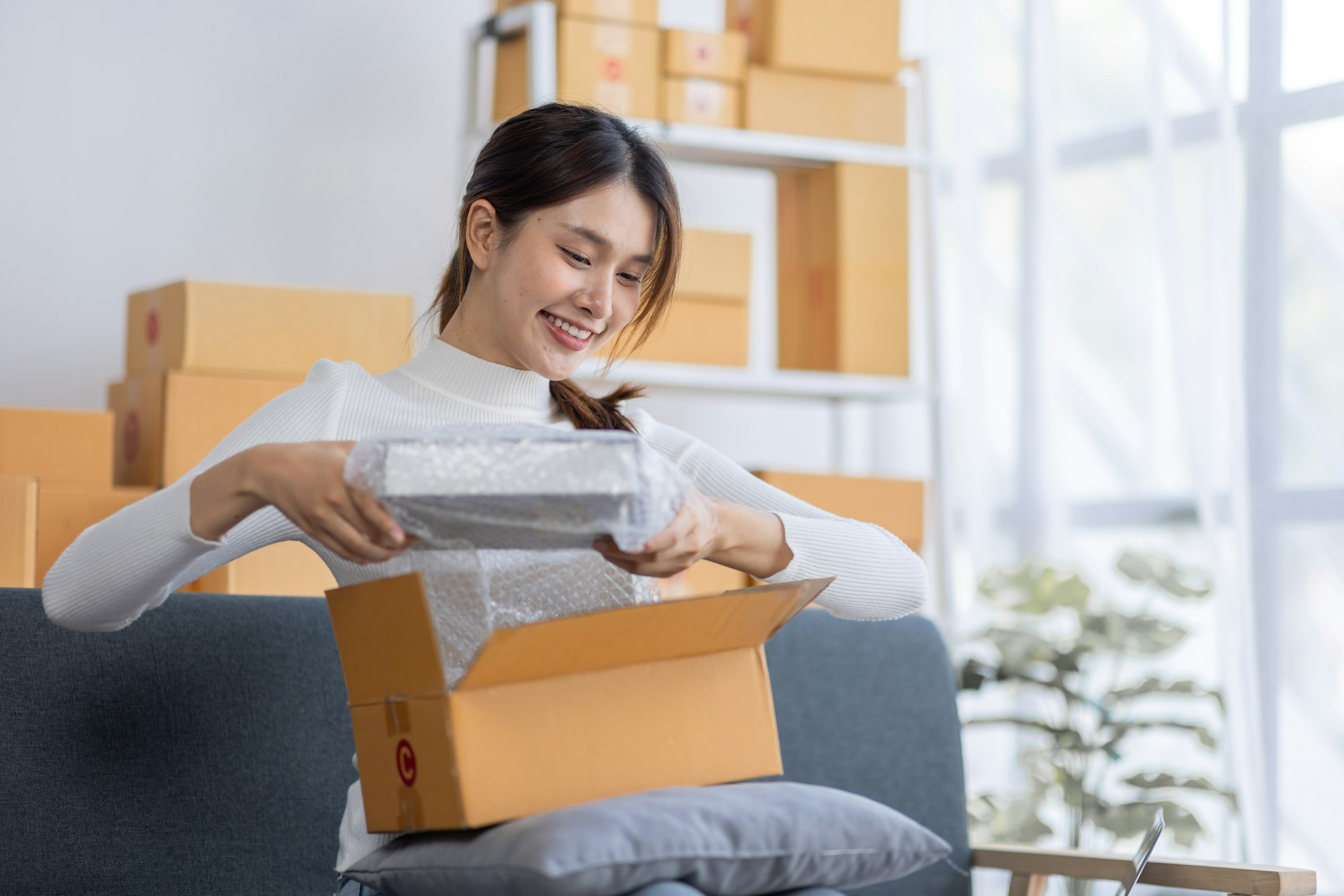 Portrait of Starting small businesses owners female entrepreneurs working on receipt box and check o